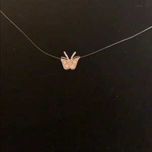 Butterfly pendant on filament
